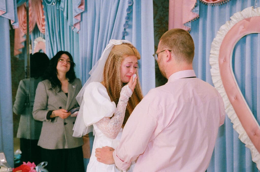 cute couple emotional reading their vows