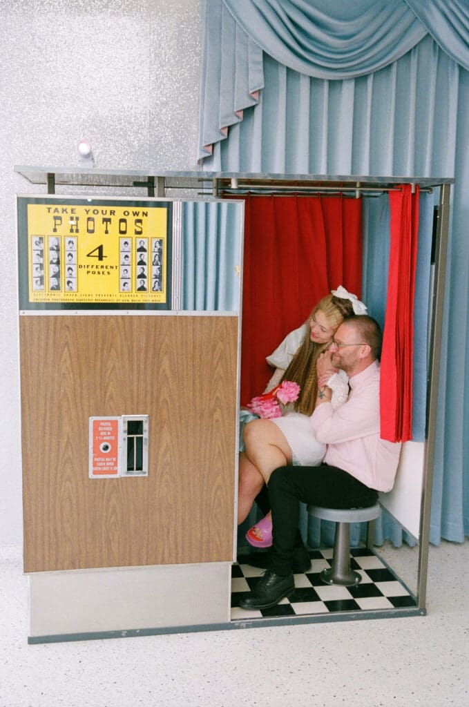 cute couple a photo booth after their elopement ceremony