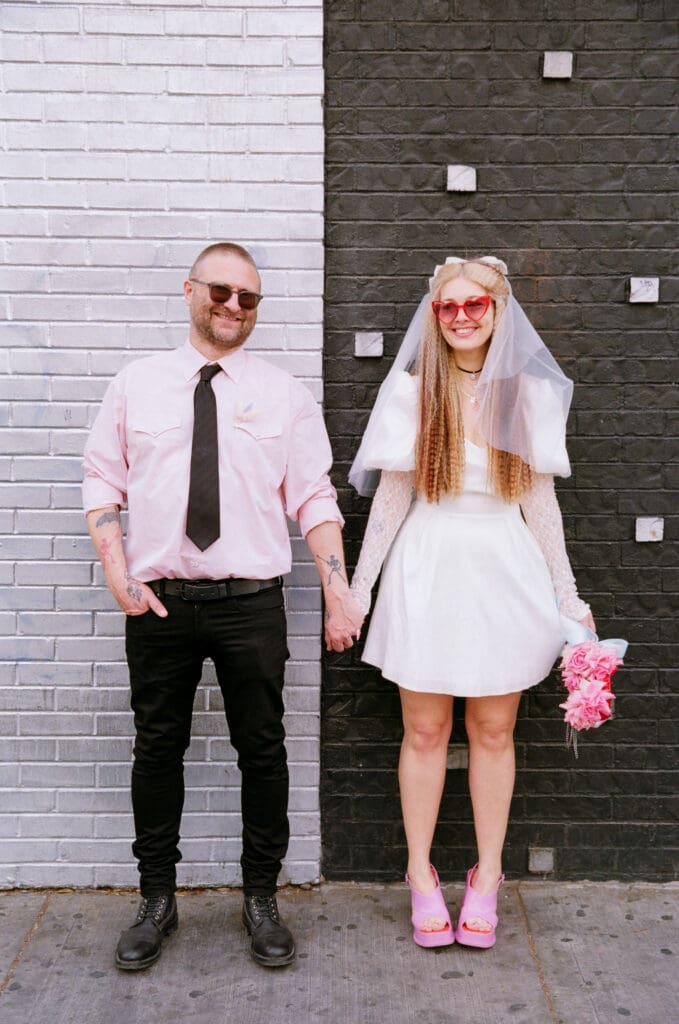 couple posing for their bridal portraits at their elopement
