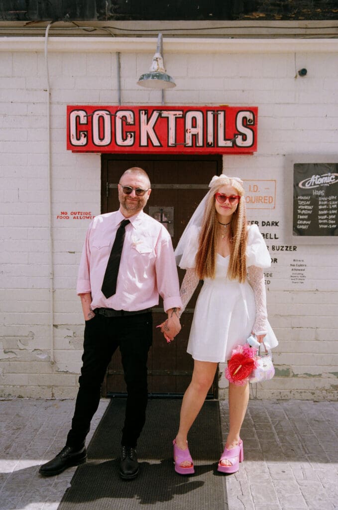 bride and groom holding hands at their elopement