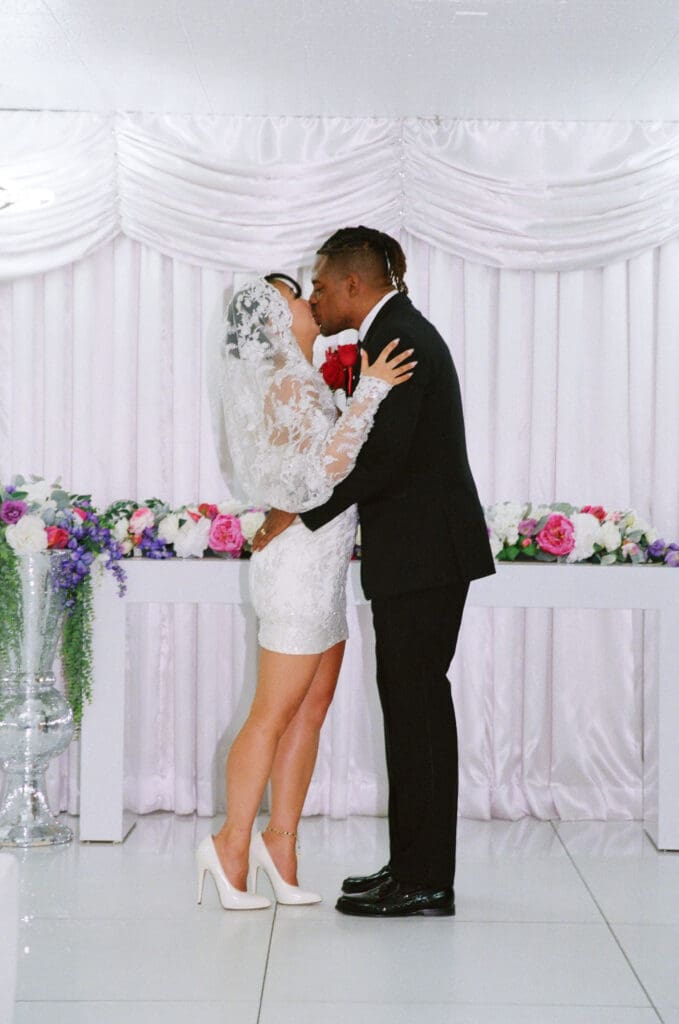 bride and groom kissing after their elopement ceremony