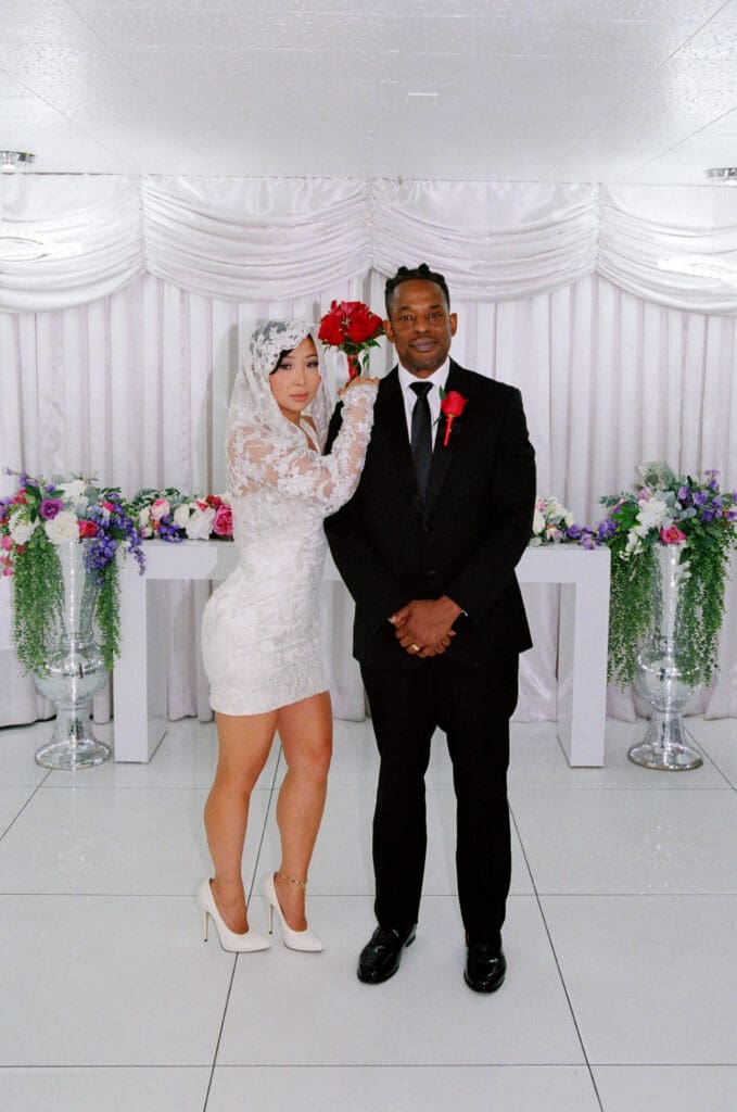 bride and groom posing for the camera during their elopement photoshoot