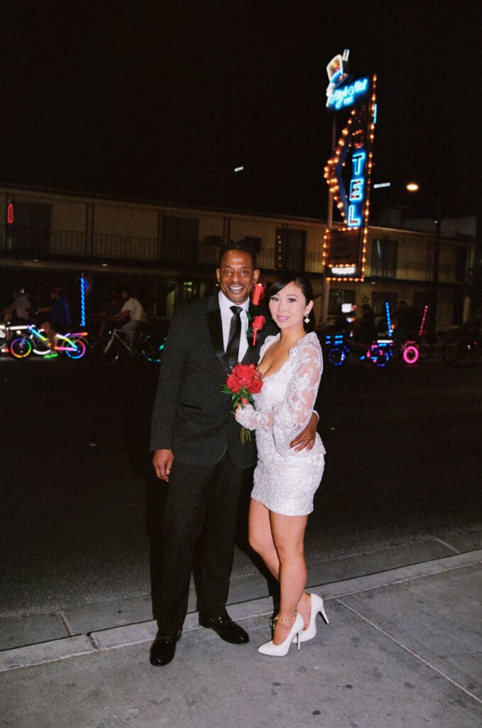 couple exploring fremont street during their elopement