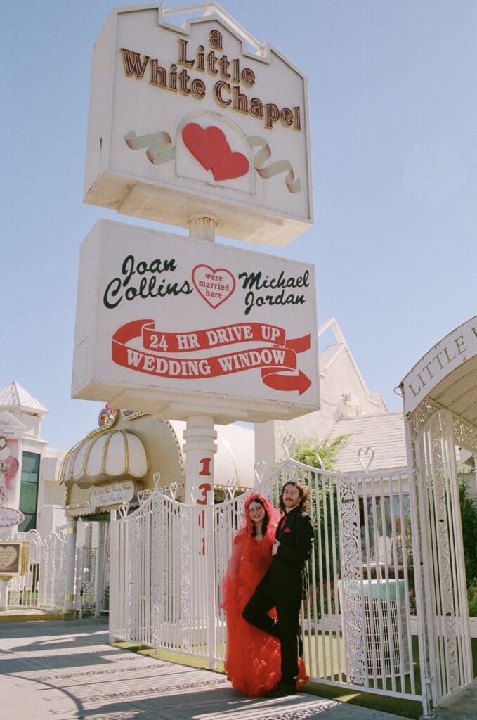 happy couple at their little white wedding chapel elopement