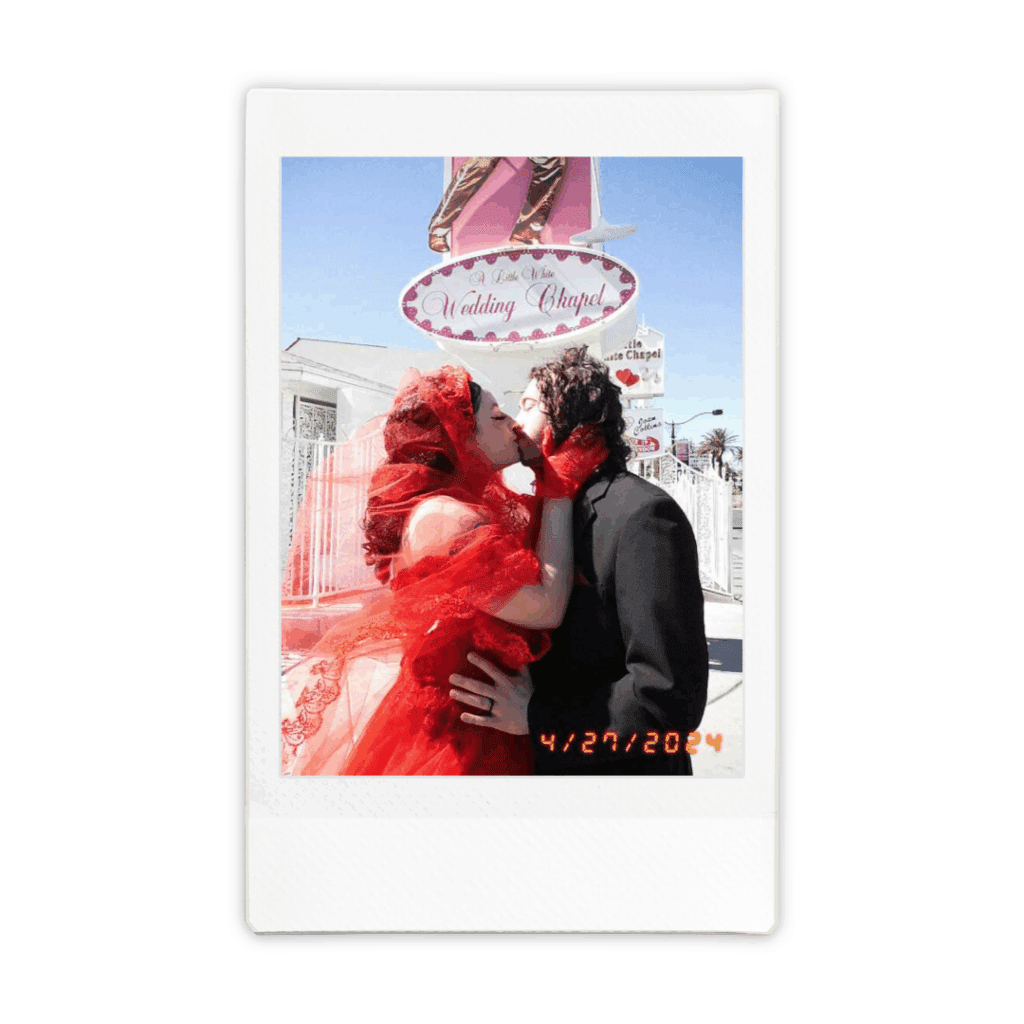 cute picture of the newlyweds kissing during their bridal portraits