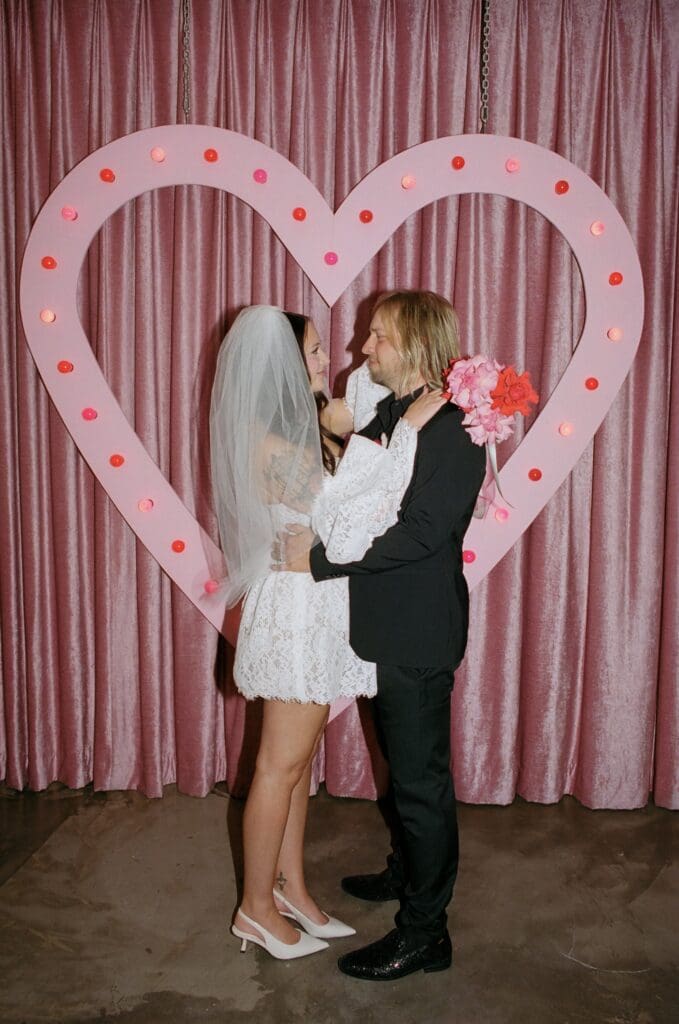 cute picture of the bride and groom kissing