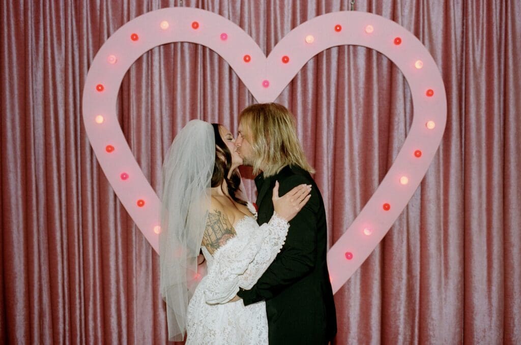 portrait of the bride and groom kissing after their elopement ceremony