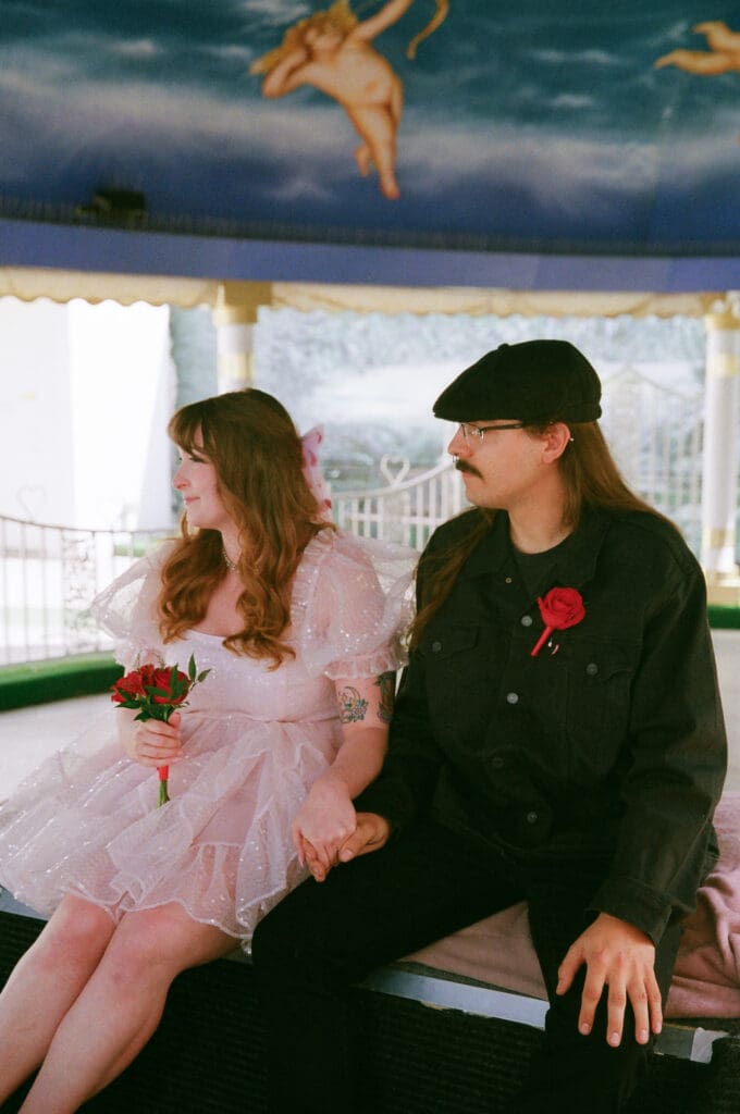 cute couple holding hands during their dream ceremony