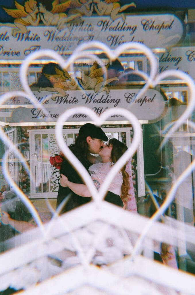 cute picture of the newlyweds kissing