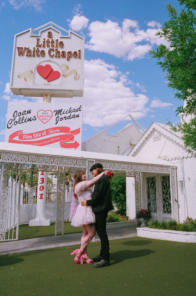 picture of the bride and groom laughing with each other 