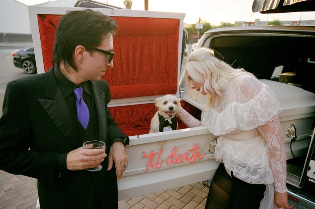 cute picture of the newlyweds and their dog