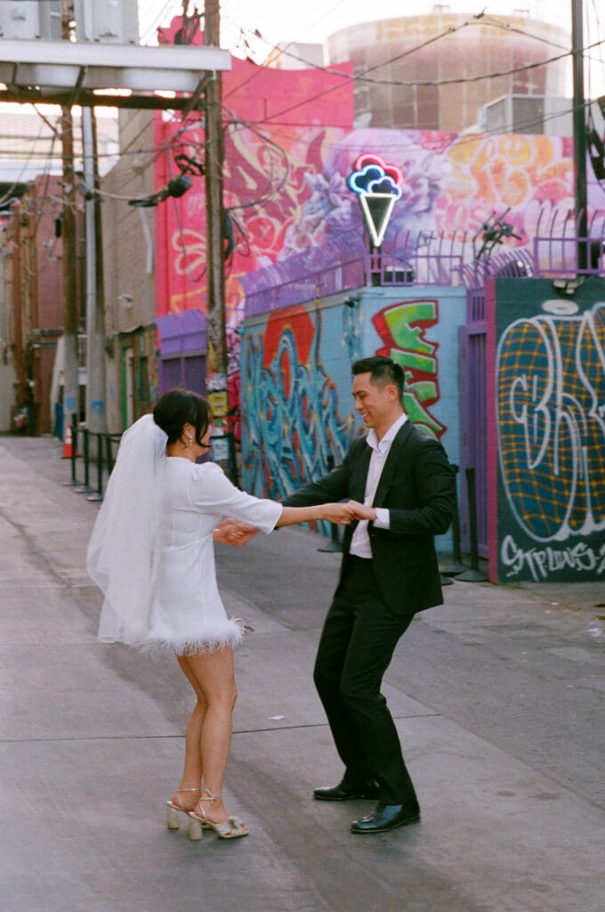 cute couple dancing during their bridal portraits