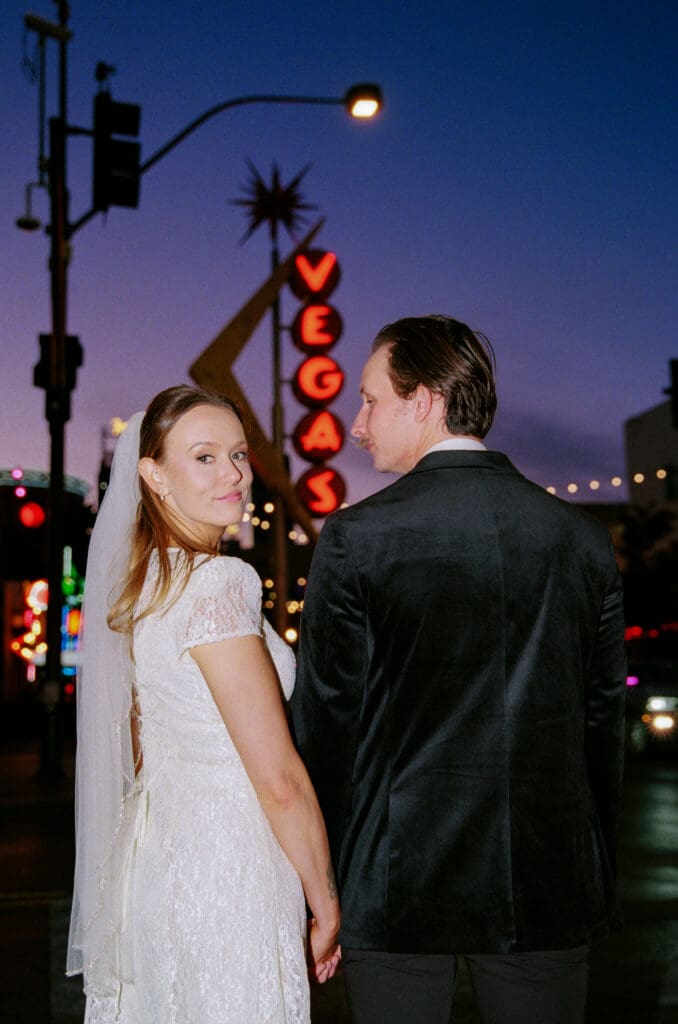 couple holding hands walking around DTLV