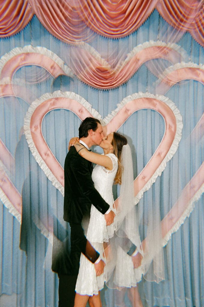 picture of the newly married couple kissing