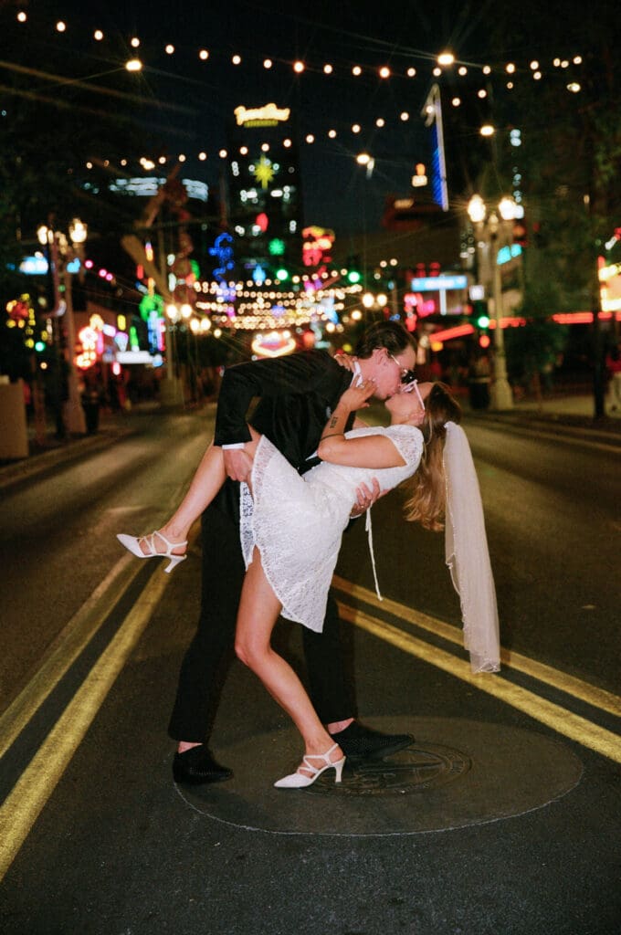 portrait of the newly married couple kissing