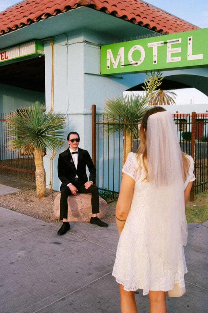 portrait of the groom admiring the bride