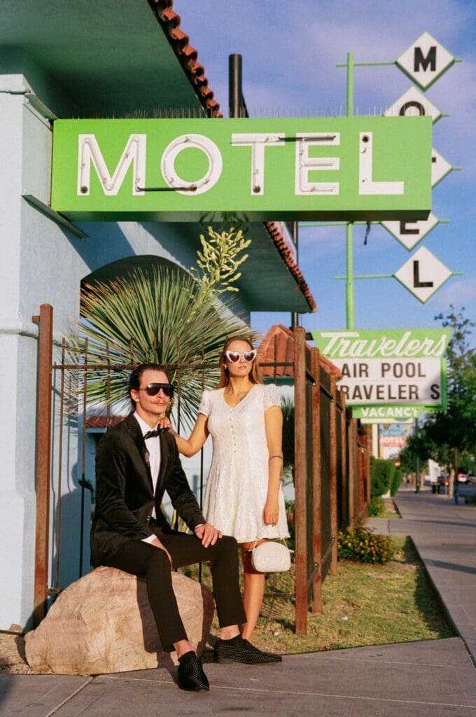couple smiling at the camera during their photoshoot
