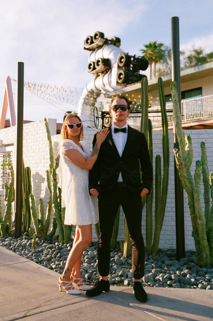 couple smiling at the camera during their photoshoot