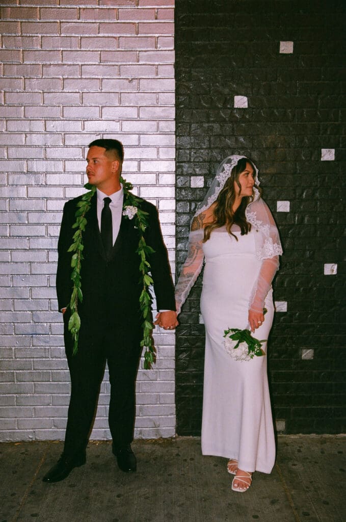 couple walking around DTLV after their elopement ceremony