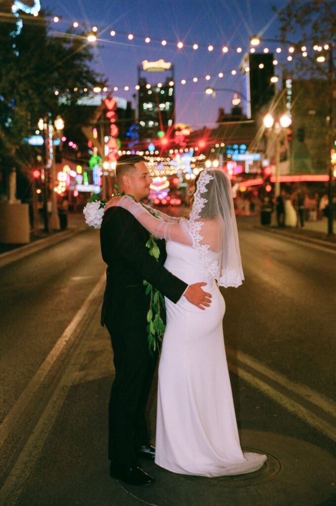 portrait of the newlyweds smiling at each other