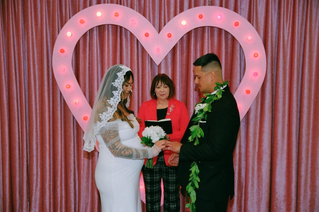 bride and groom smiling at each other during their ceremony
