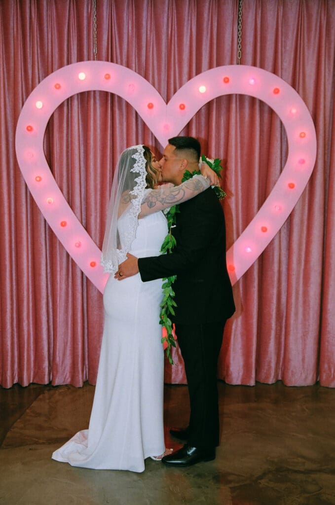 bride and groom kissing after their ceremony