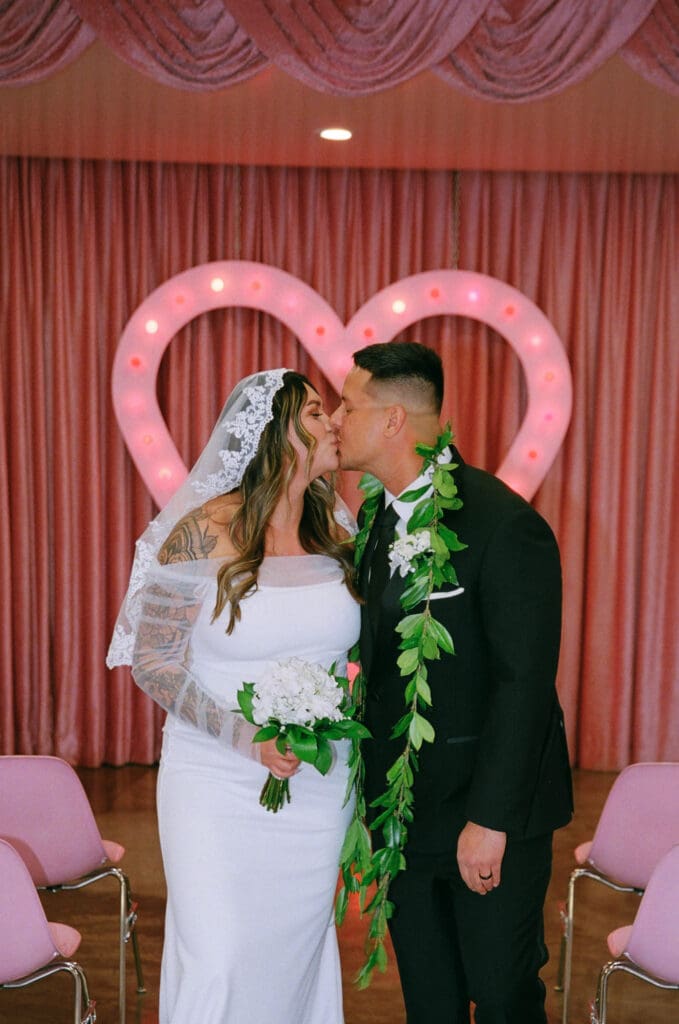 cute picture of the newlyweds kissing