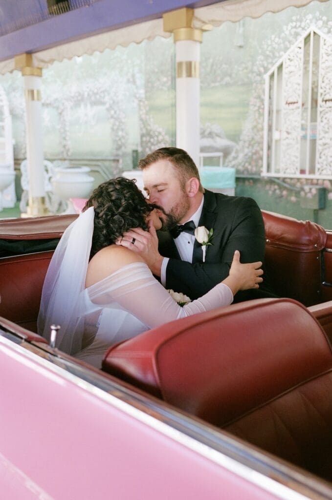 bride and groom kissing after their ceremony