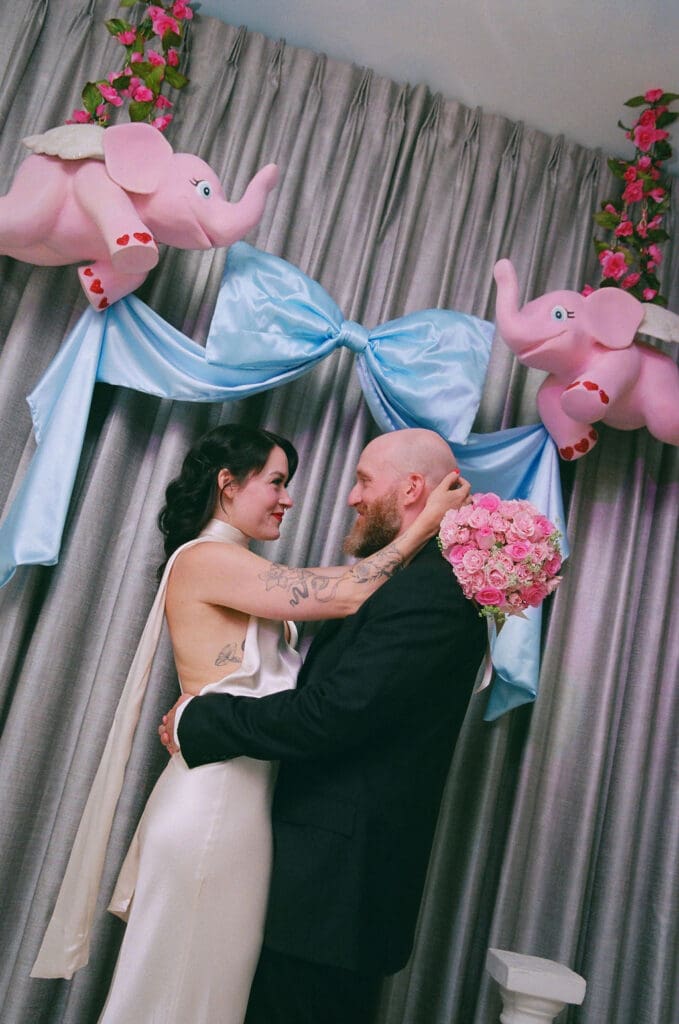 portrait of the newlyweds smiling at each other