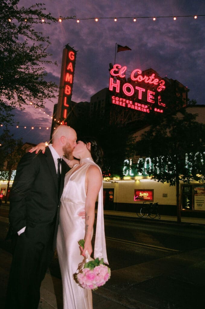 Newlyweds, kissing during their bridal photos