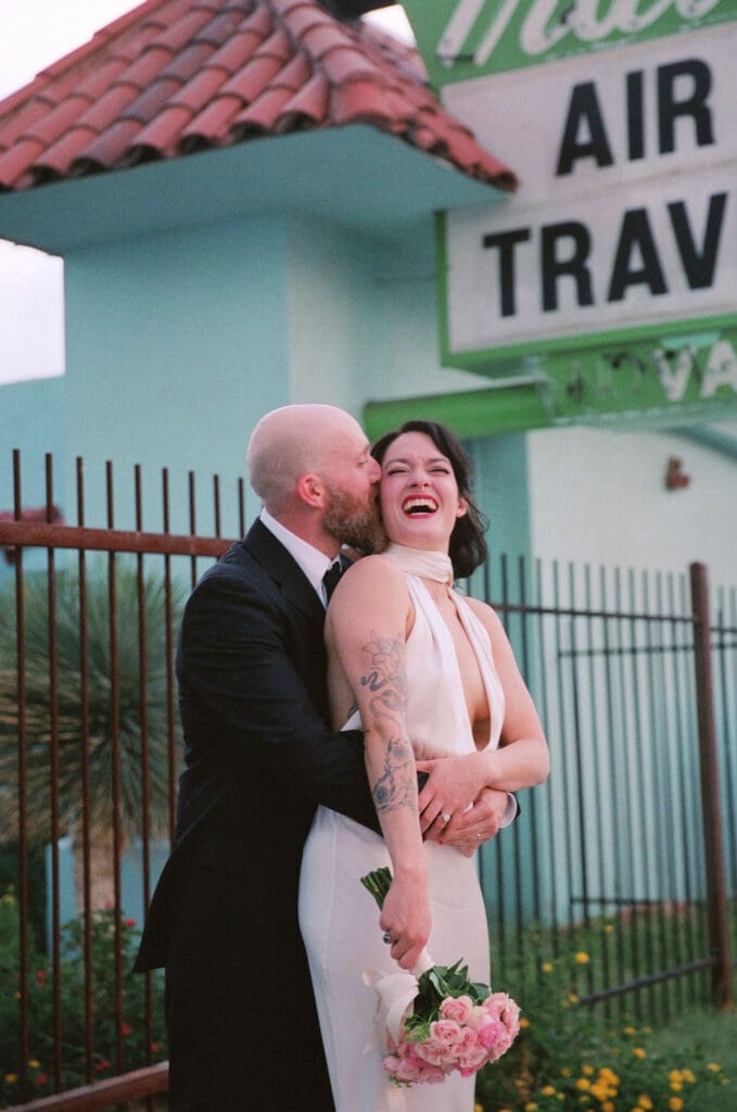 couple laughing with each other during their photoshoot