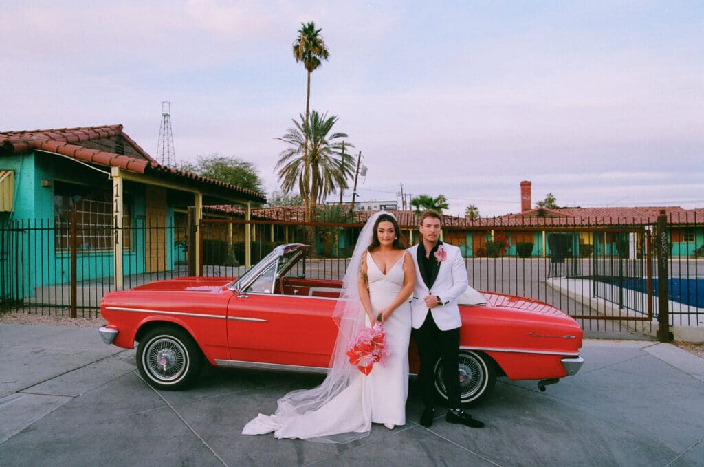 couple smiling at the camera during their bridal photos