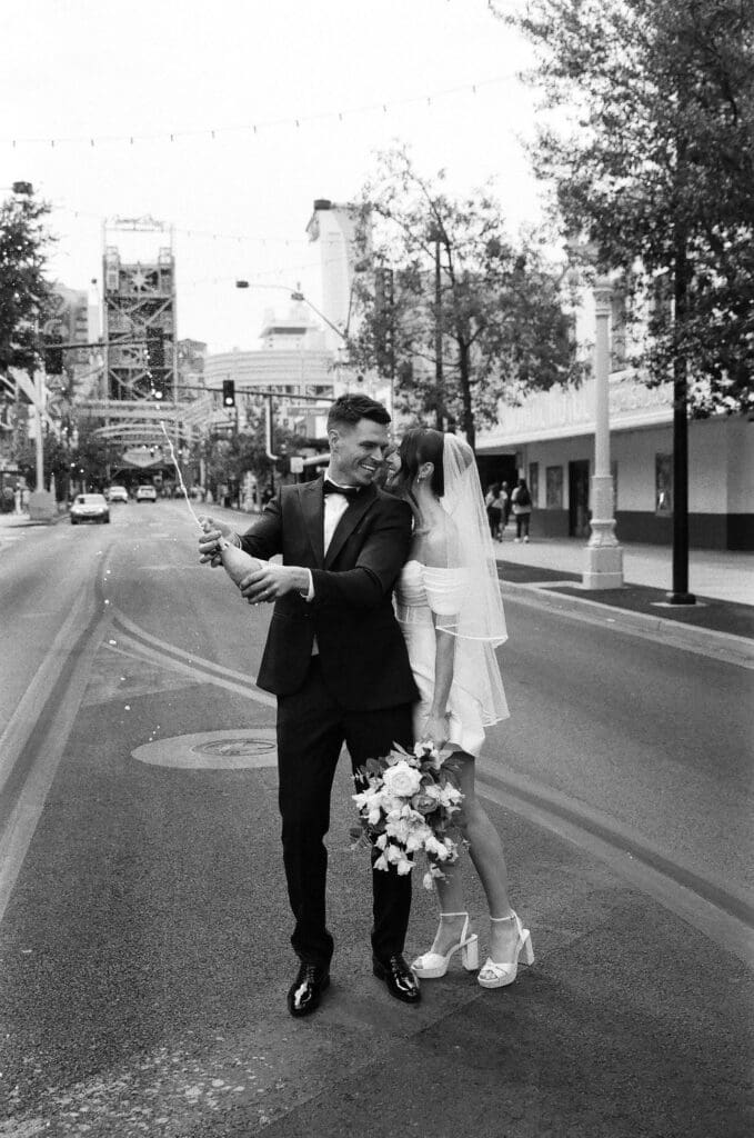bride kissing the groom on the cheek