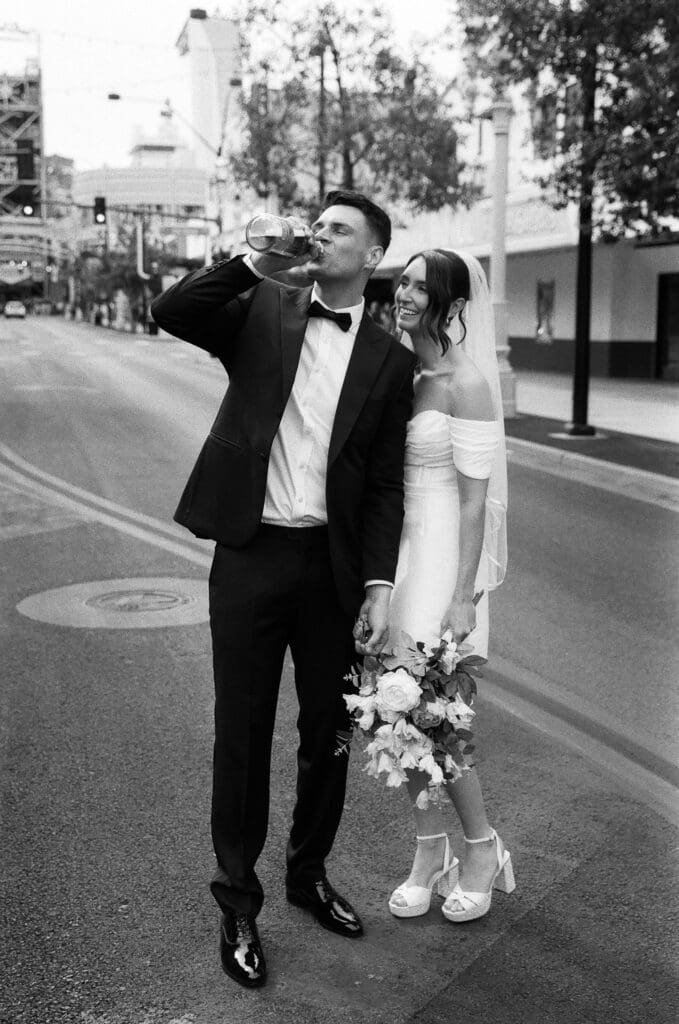 couple celebrating their elopement with champagne