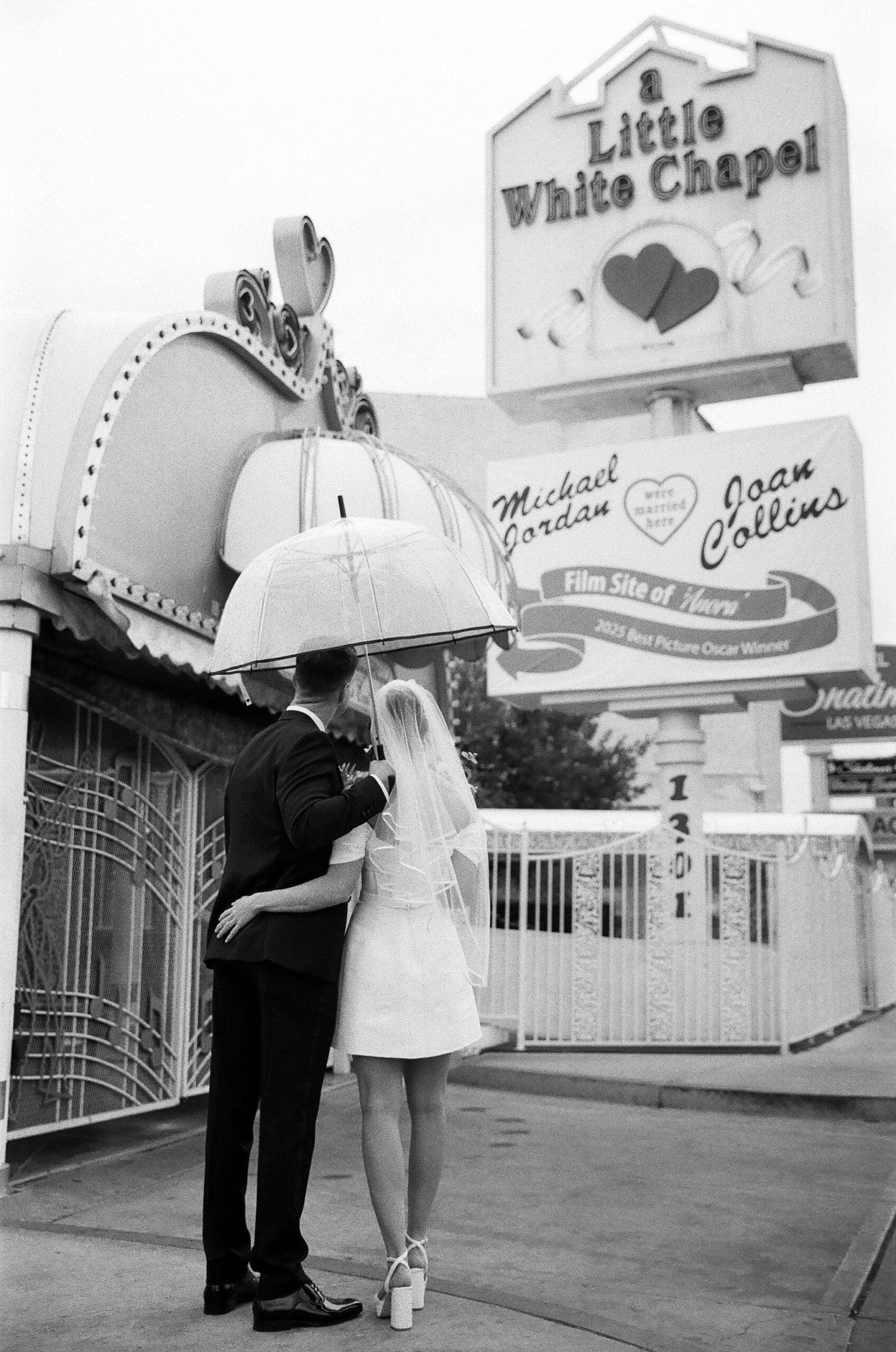 newly married couple hugging