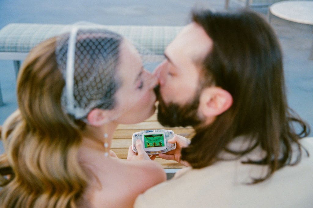 portrait of the newlyweds kissing