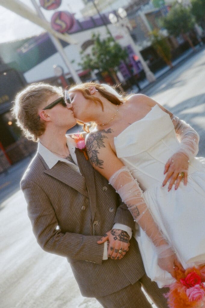 portrait of the bride and groom kissing in DTLV