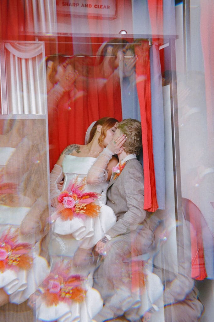 cute picture of the newlyweds kissing