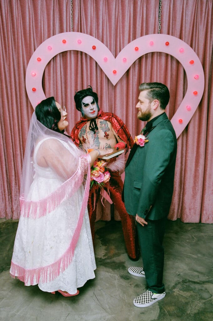 bride and groom laughing with each other during their photoshoot