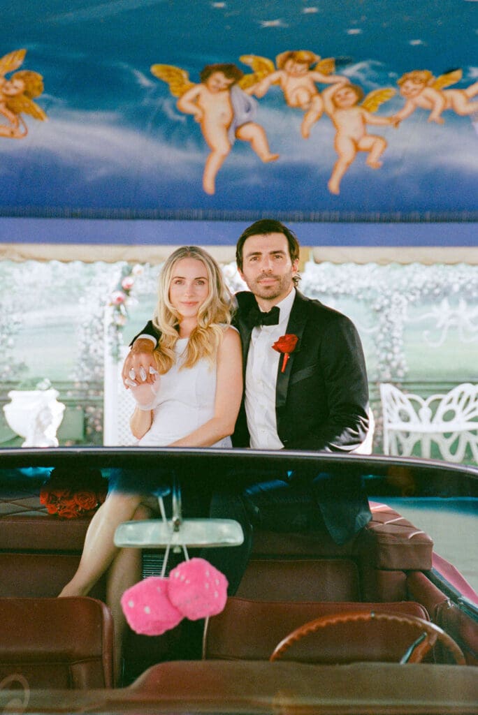 couple smiling at the camera during their bridal photos