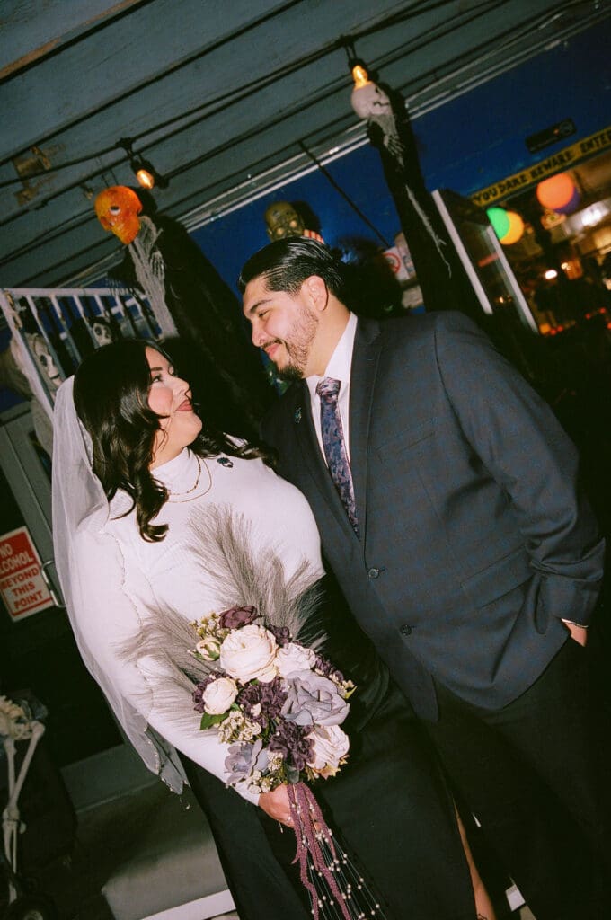 picture of the bride and groom smiling at each other
