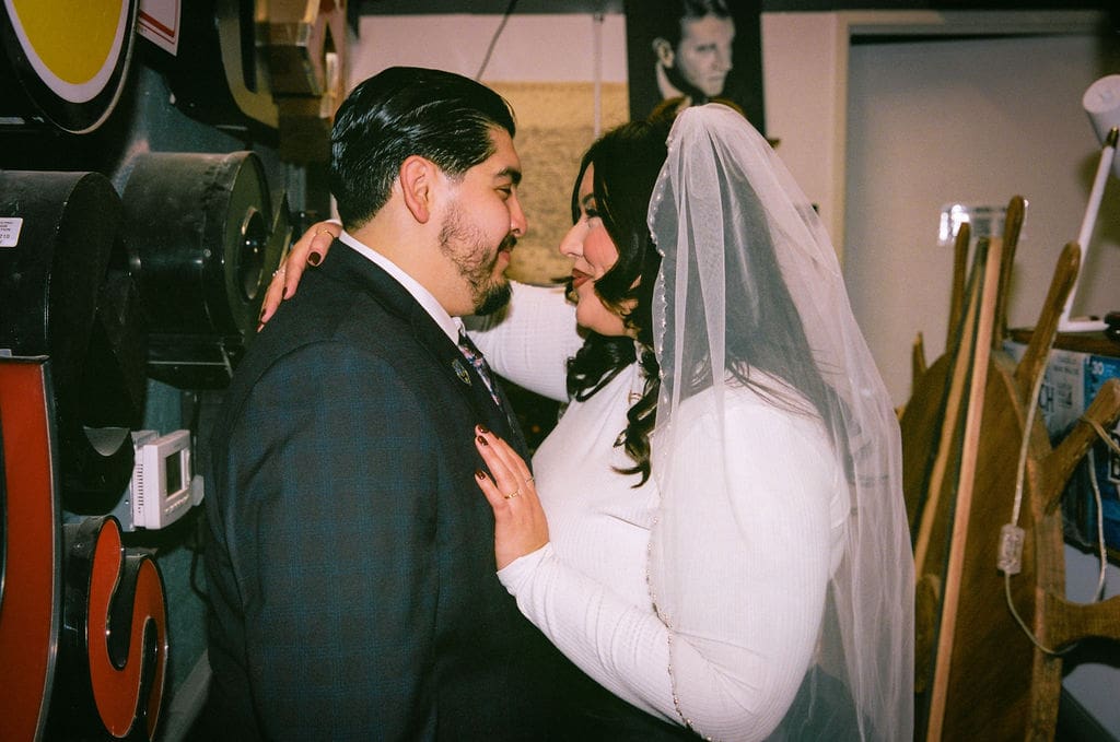 cute picture of the newlyweds smiling at each other