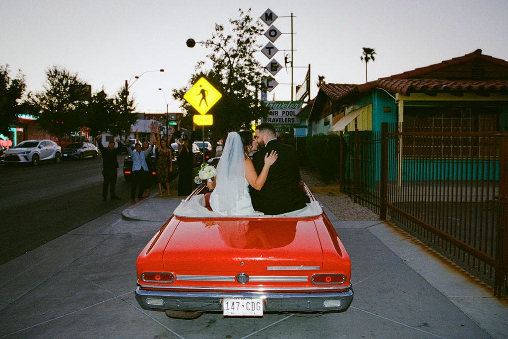 portrait of the newly married couple kissing