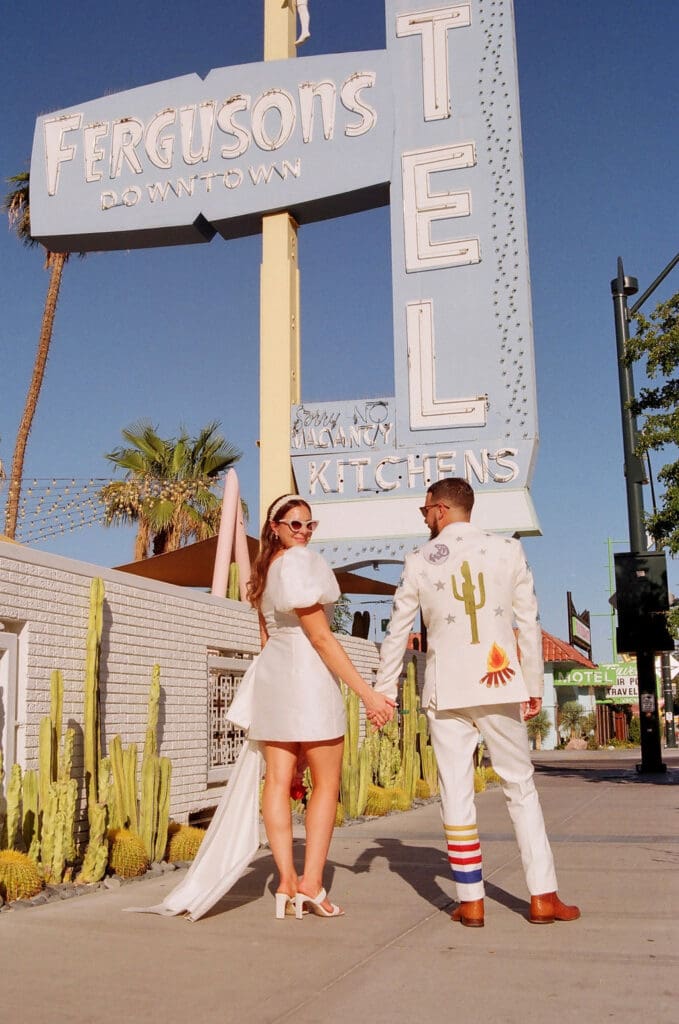 couple holding hands during their bridal portraits