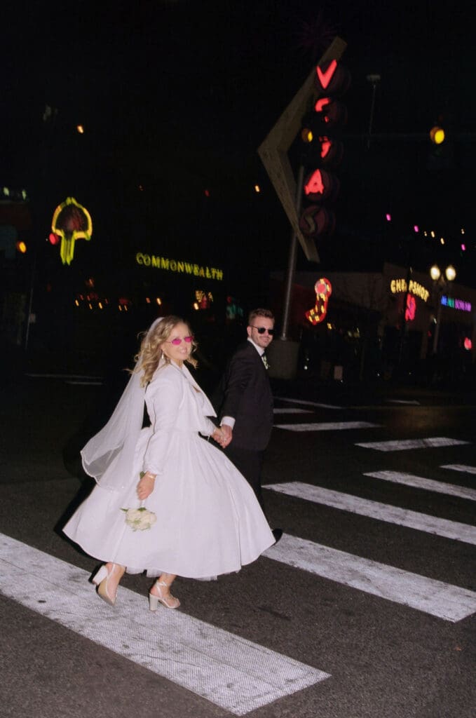 couple walking around vegas during their photoshoot