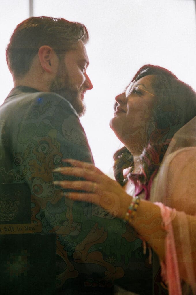 cute picture of the bride and groom smiling at each other