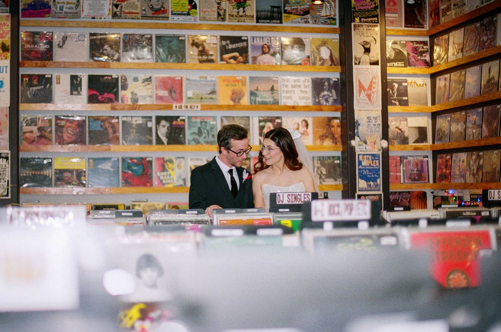 groom kissing the bride during their photoshoot