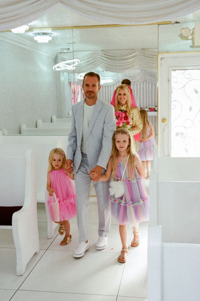 portrait of the groom walking down the aisle