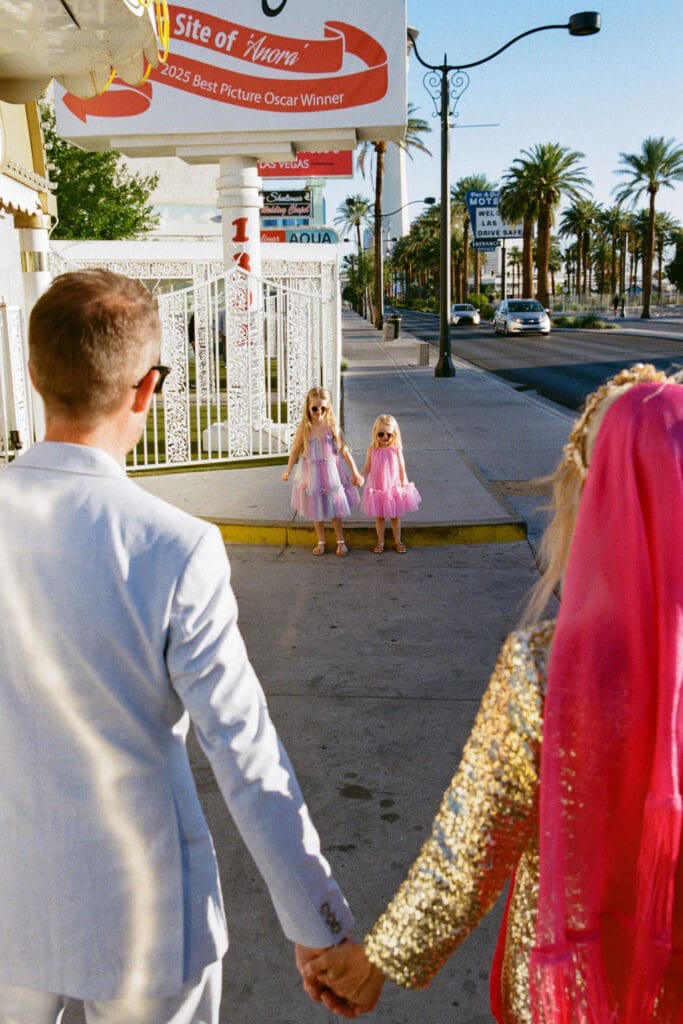 cute picture of the newlyweds with their daughters