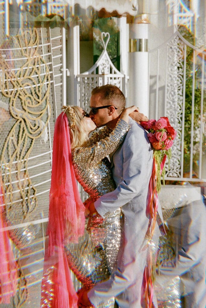 cute picture of the newly married couple kissing